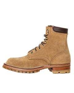 Tan color boot with aggressive sole.  6 inches tall.