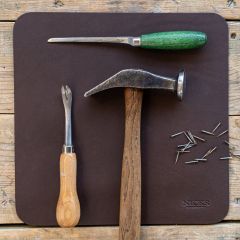 Nicks leather work mat in walnut with bootmaking tools