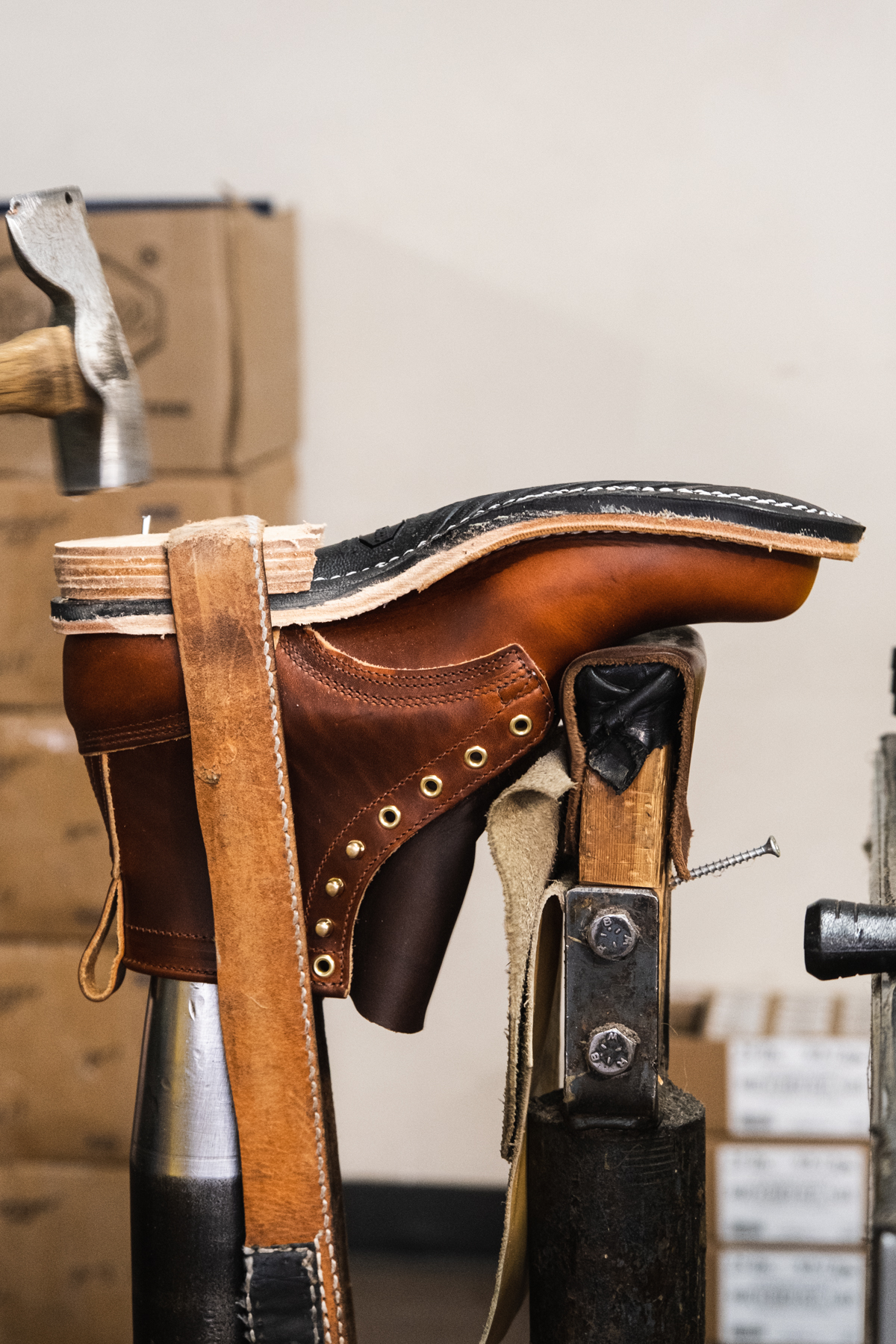 Nicks handmade boots going through bottoming. Getting a full leather heel stack.