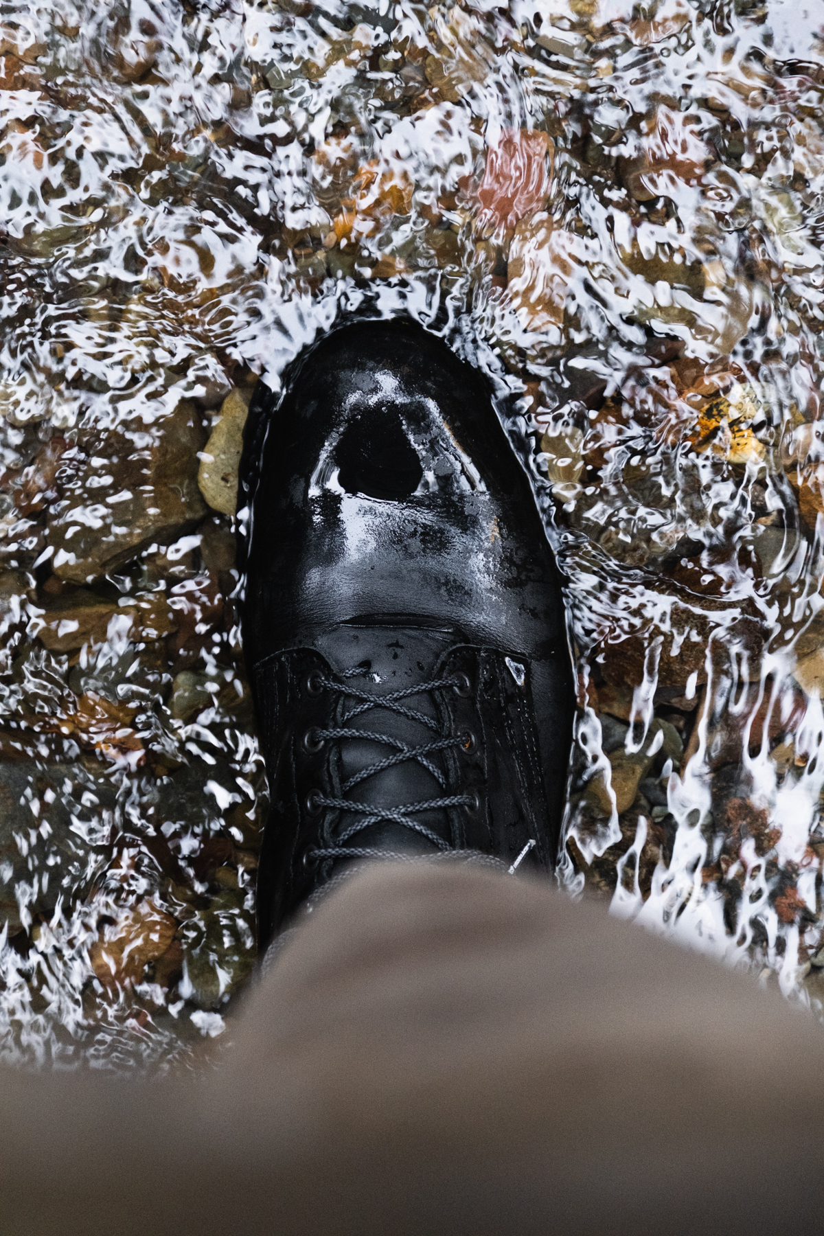 Nicks Waterwork in Weathershield Black Smooth wading through a creek
