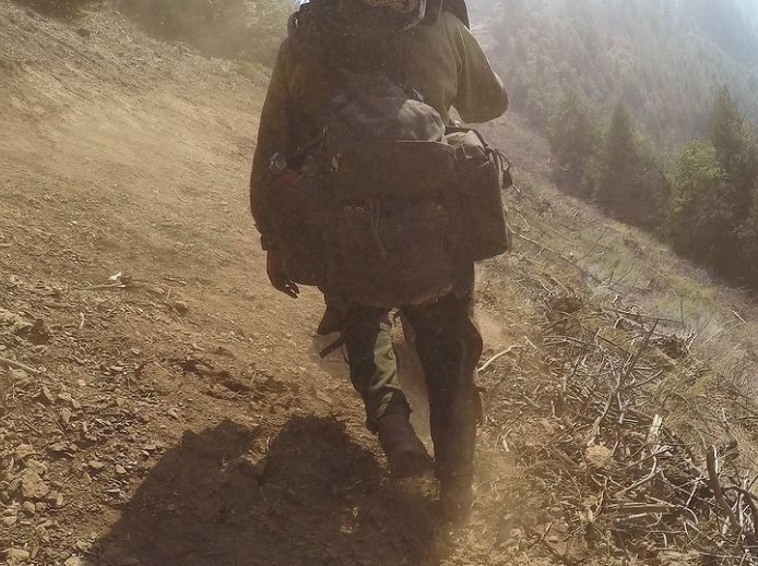 wearing a set of logger boots